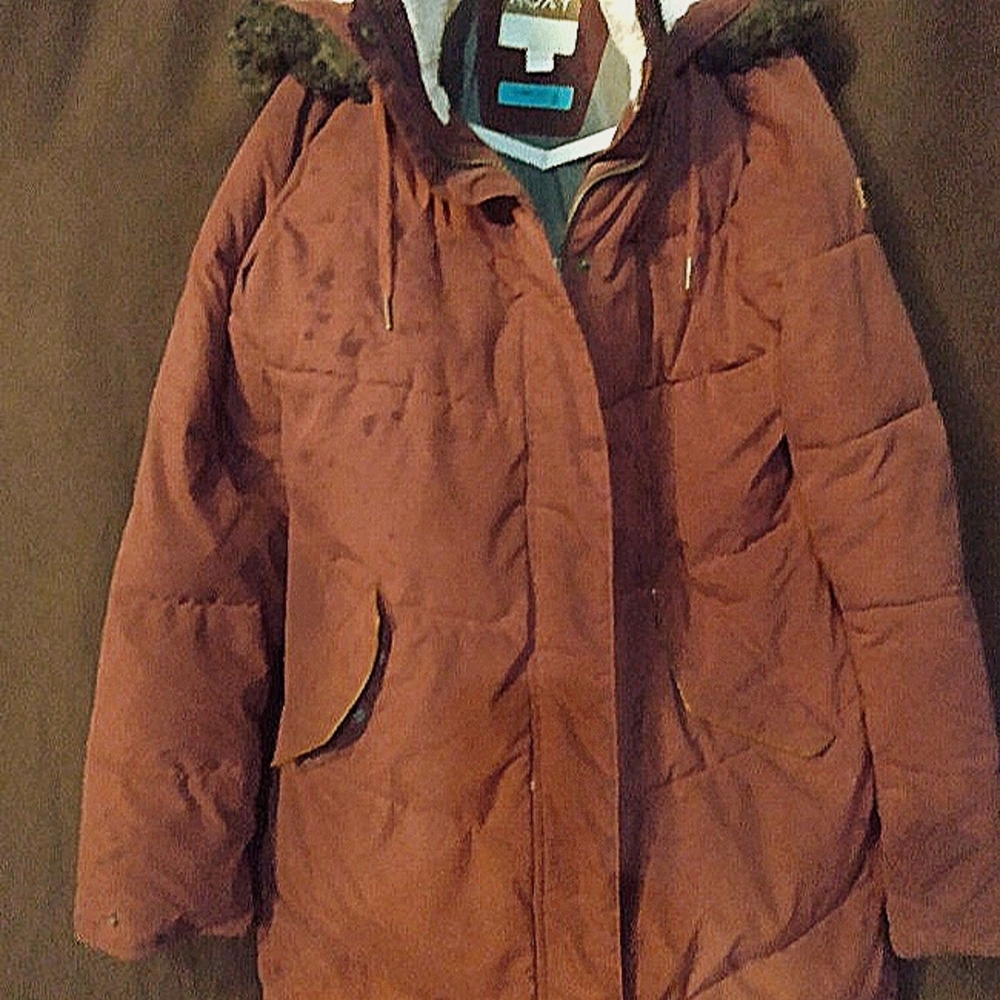 Women's Red Roxy winter coat was purchased a year ago. No damages